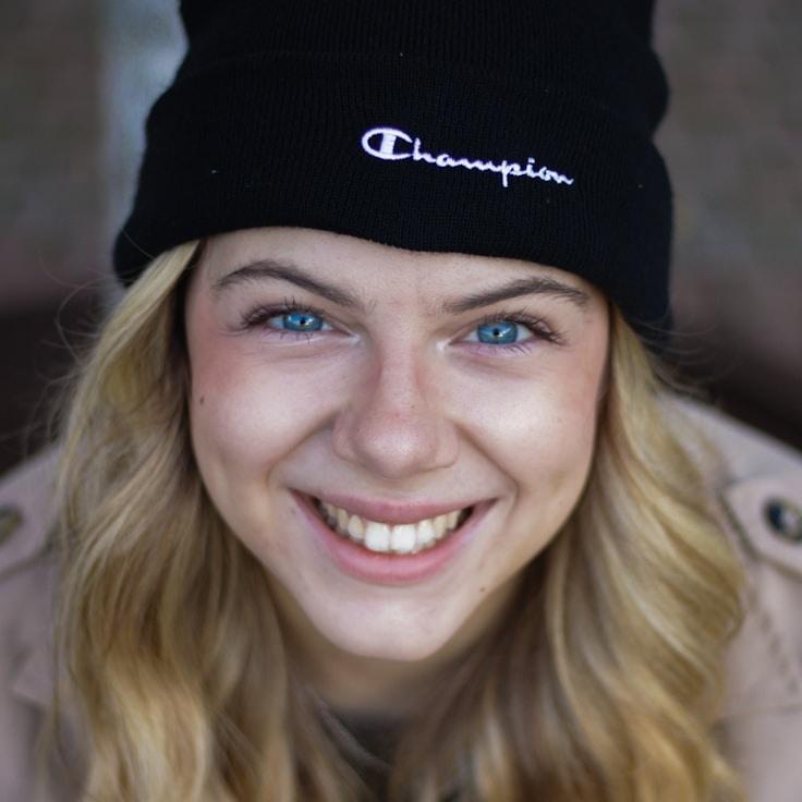 Kaveri Mehta, Lead Design Curator at Silver Line Works, reviewing corporate floral arrangements